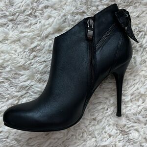 Heeled booties from Kazakhstan. Leather. Black. Women's US size 7.5. EU 38.